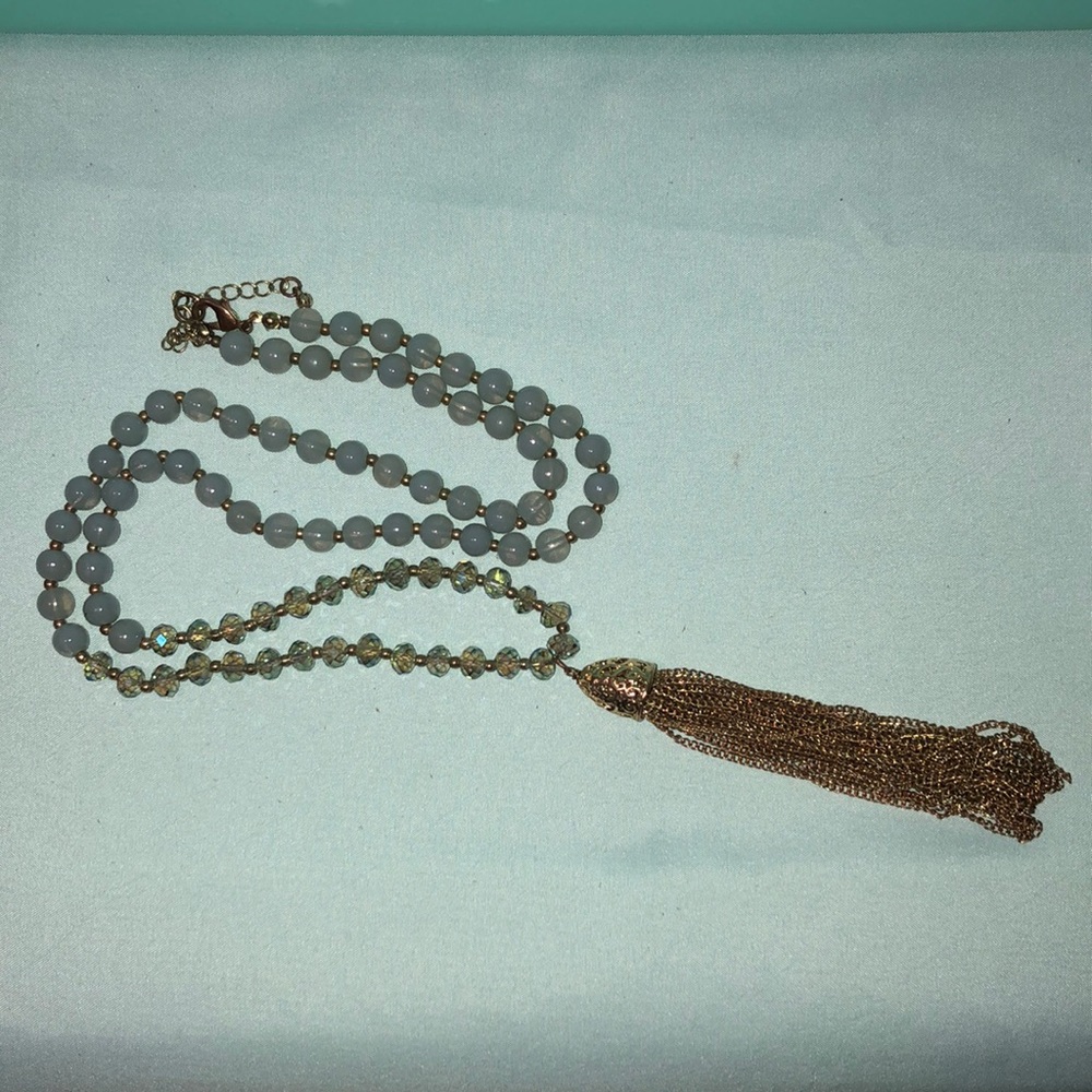 Light blue/iridescent beaded necklace with tassel